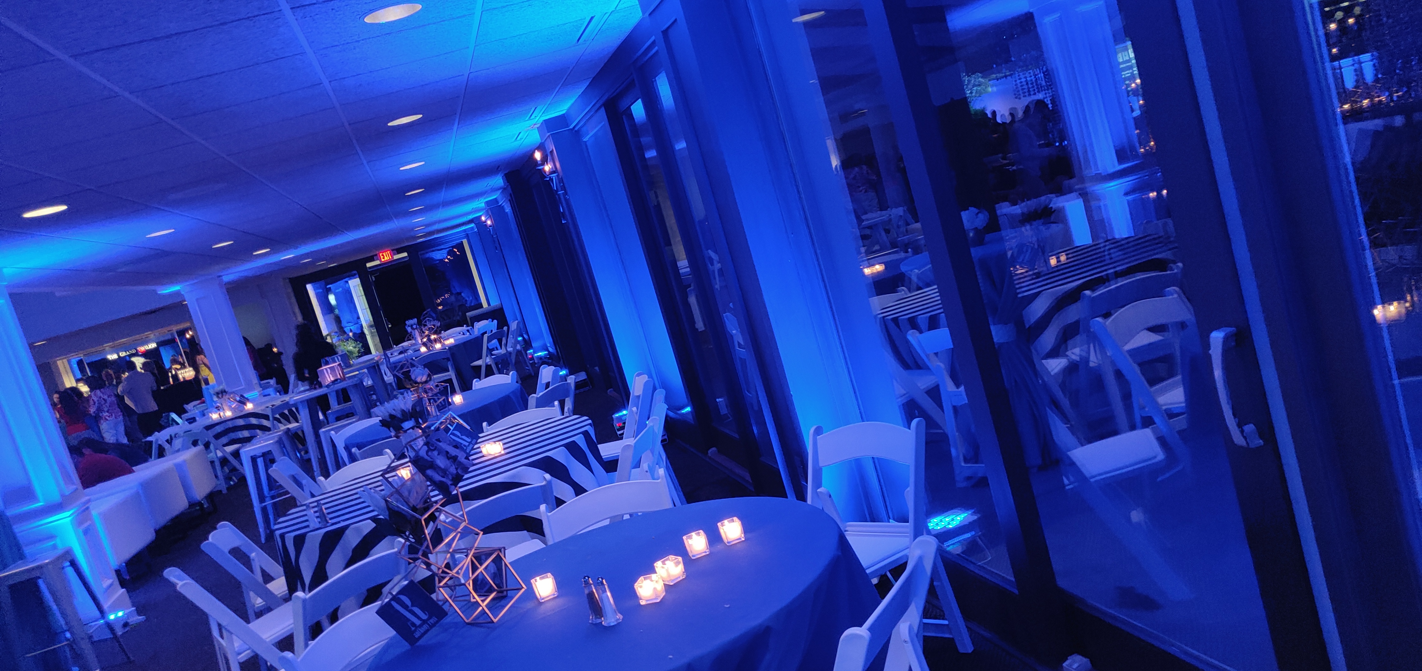 Color-changing accent lighting on a reception ceiling